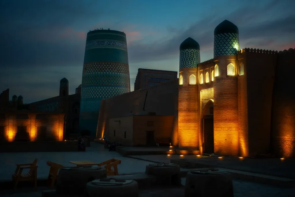 View of Khiva at night in front of Terrassa Cafe & Restaurant
