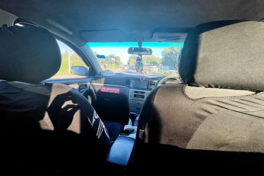 Taking airport taxi to Crowne Plaza Fiji.