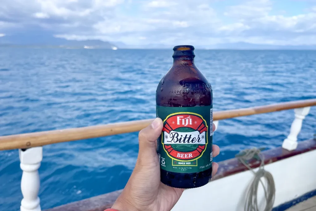 Enjoying Fiji beer on Whales Tale Cruise.
